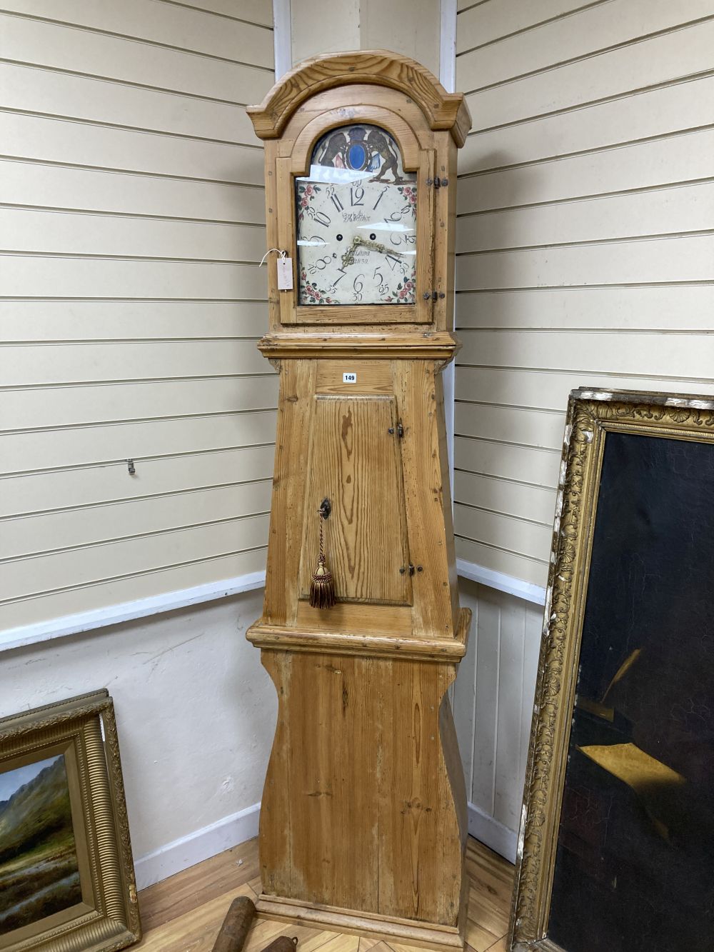 A Swedish pine longcase clock, G H Welcher, Eskilstuna, with painted dial, height 216cm